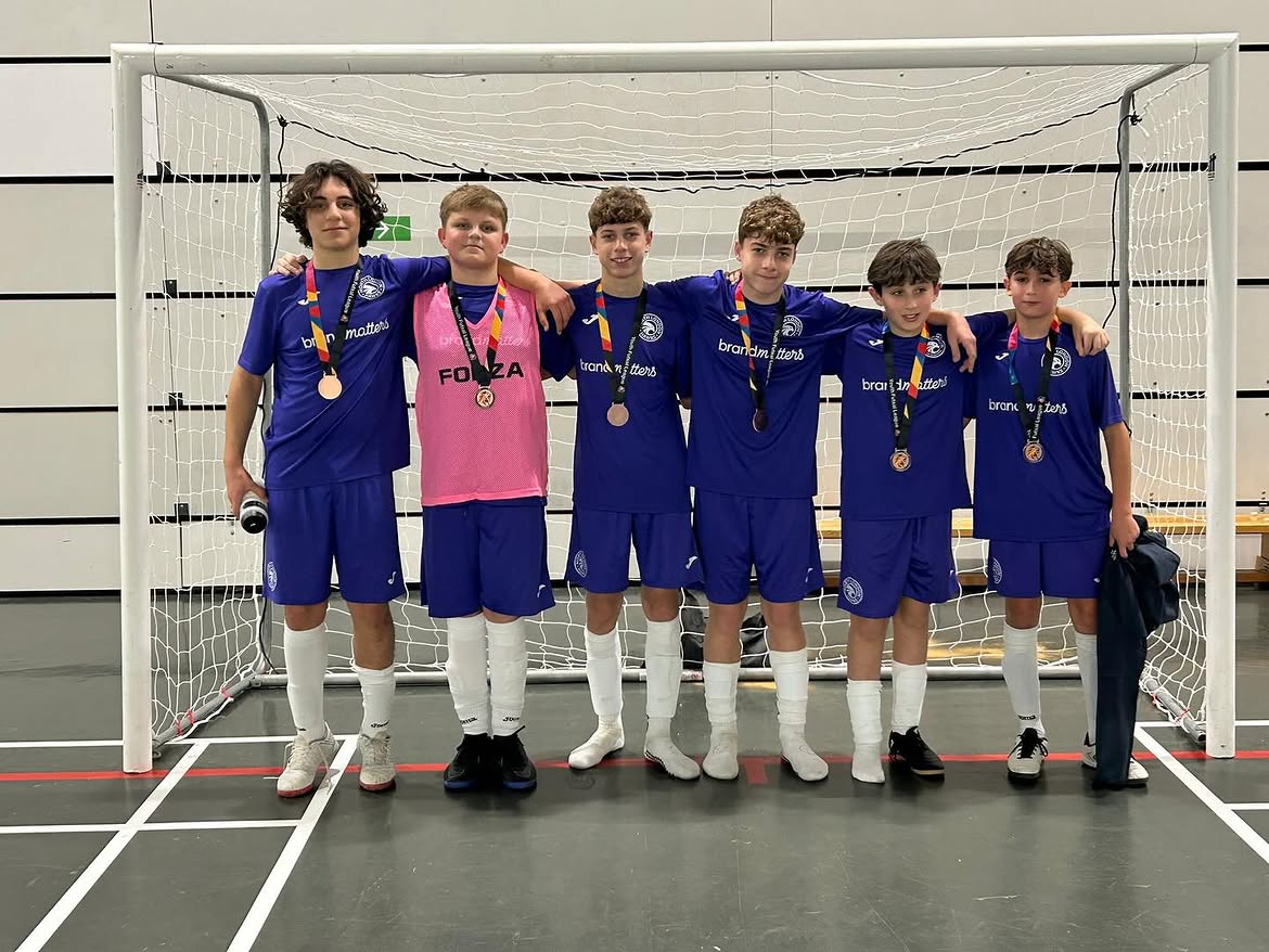 Hawks Futsal players with medals